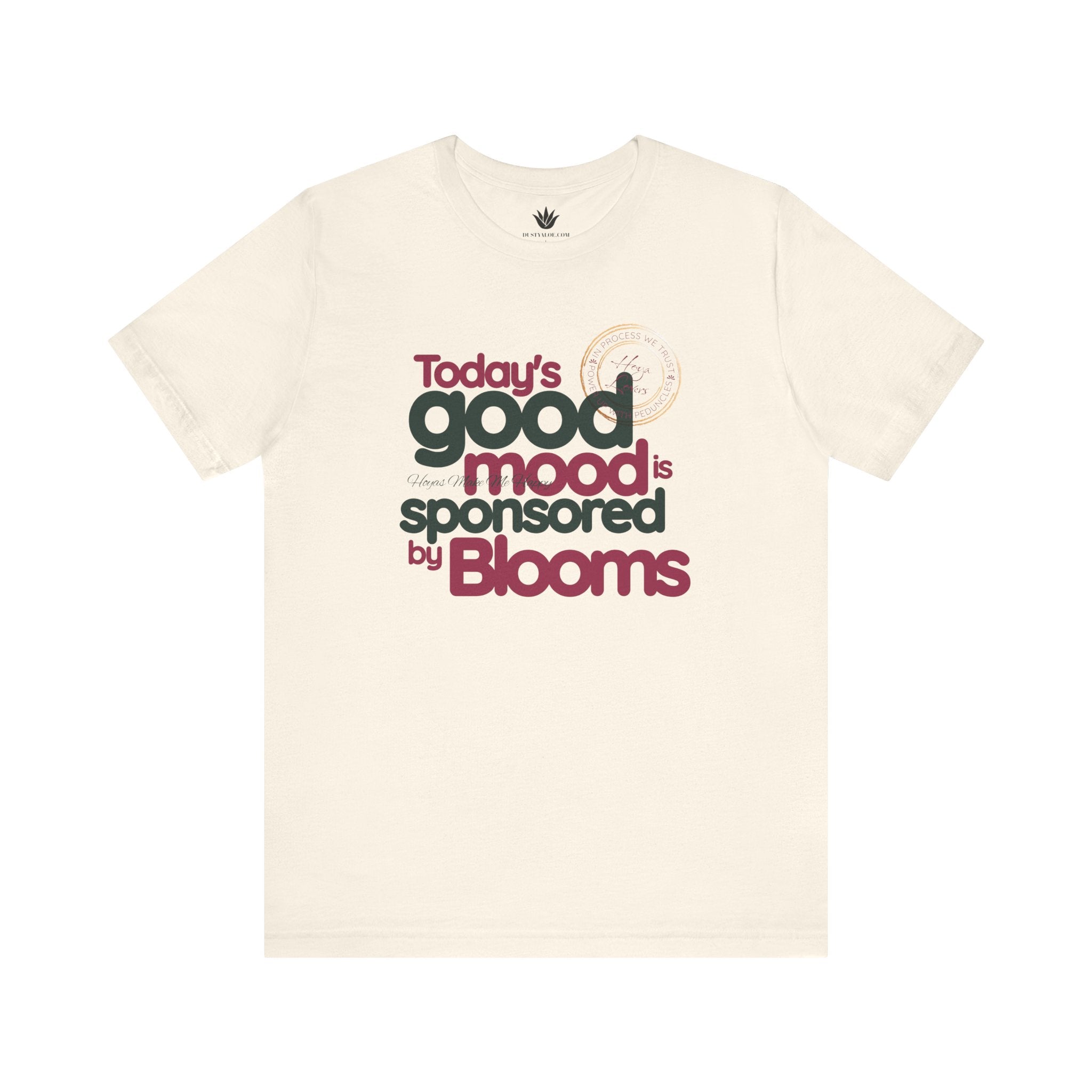 Beige t-shirt with text 'Today's good mood is sponsored by Blooms' on a white background