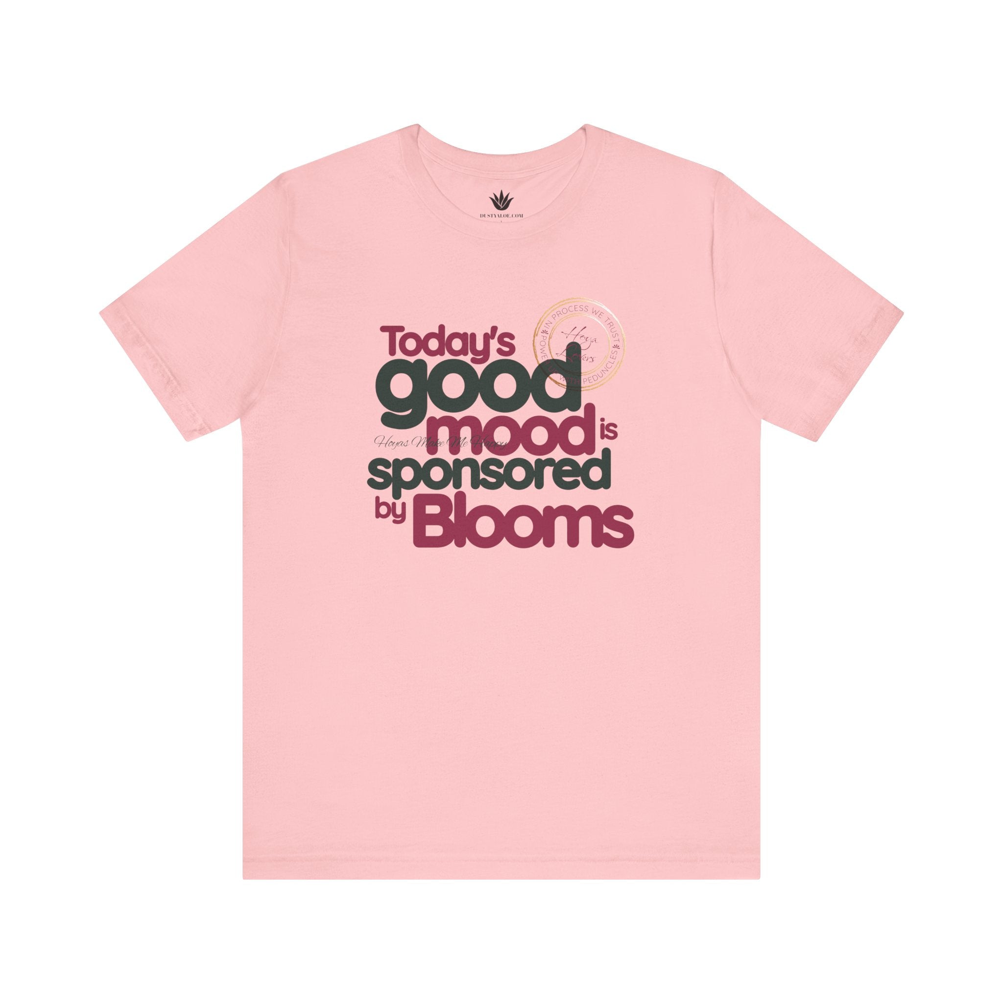 Pink t-shirt with text 'Today's good mood is sponsored by Blooms' on a white background