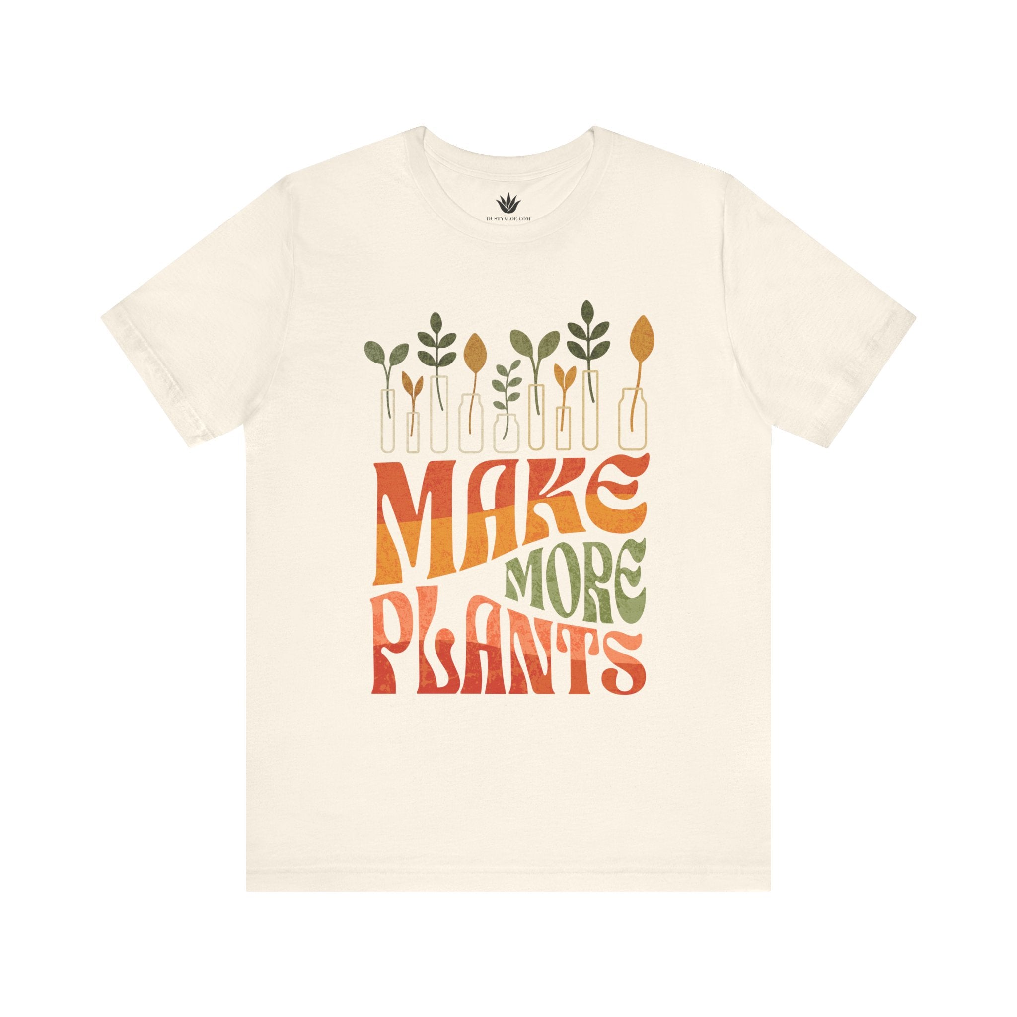 Beige t-shirt with 'MAKE MORE PLANTS' text and plant graphics on a white background