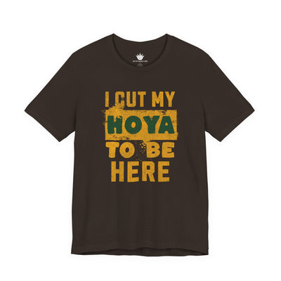 Black t-shirt with yellow text 'I cut my Hoya to be here' on a white background