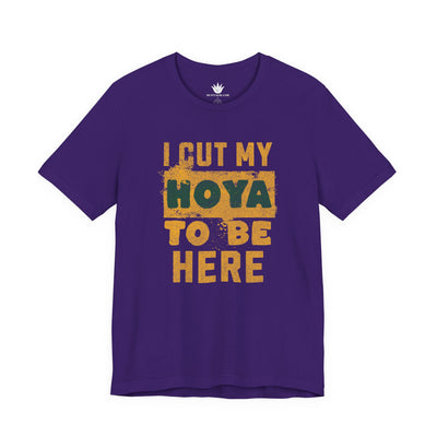 Purple t-shirt with yellow and green text on a white background