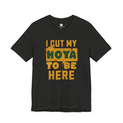Black t-shirt with yellow text 'I cut my Hoya to be here' on a white background