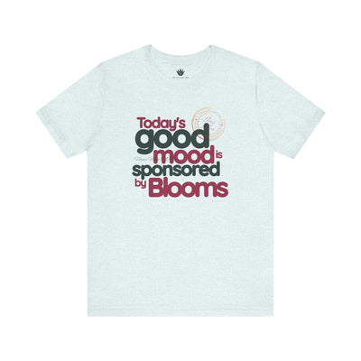 Light blue t-shirt with text 'Today's good mood is sponsored by Blooms' on a white background