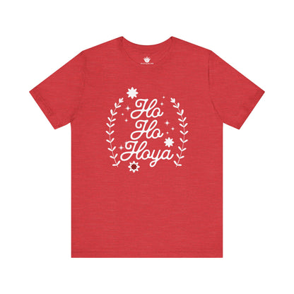 Red t-shirt with white 'Ho Ho Hola' text and floral design on a white background