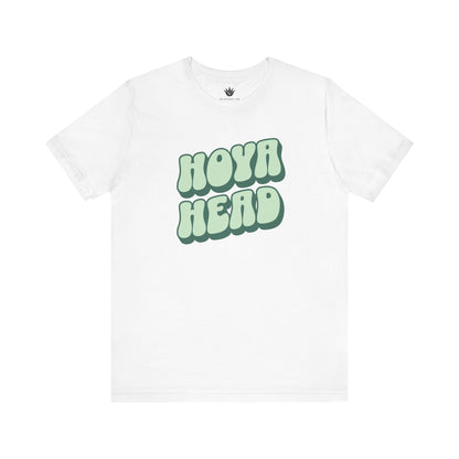 White t-shirt with 'HOYA HEAD' text in green on a white background