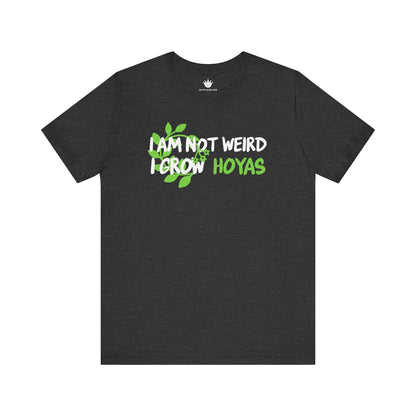 Grey t-shirt with 'I am not weird, I grow Hoyas' text on a white background