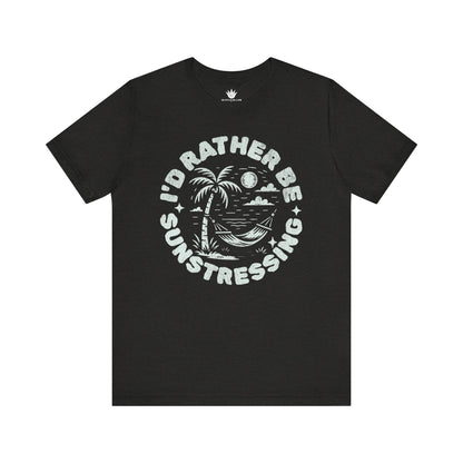 Black t-shirt with white graphic and text 'I'd Rather Be Sunstressing' on a white background