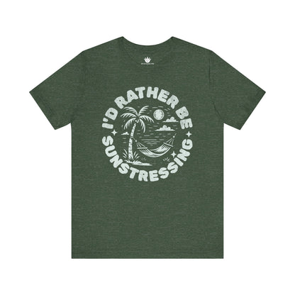 Green t-shirt with 'I'd Rather Be Sunstressing' graphic on a white background