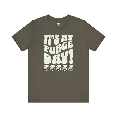 Brown t-shirt with white text 'IT'S MY PURGE DAY! $$$$$' on a white background