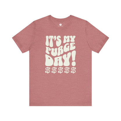Red t-shirt with white text 'It's my purge day! $$$$$' on a white background