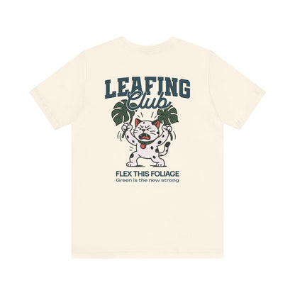Beige t-shirt with 'Leafing Club' graphic design featuring a cartoon dog and leaves on a white background.