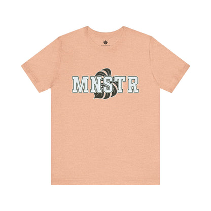 Peach t-shirt with 'MINSTR' logo on a white background