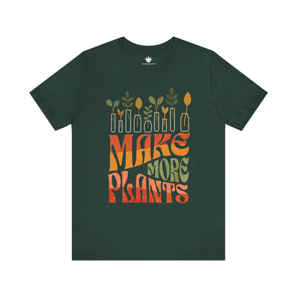 Green t-shirt with 'MAKE MORE PLANTS' text and plant graphics on a white background