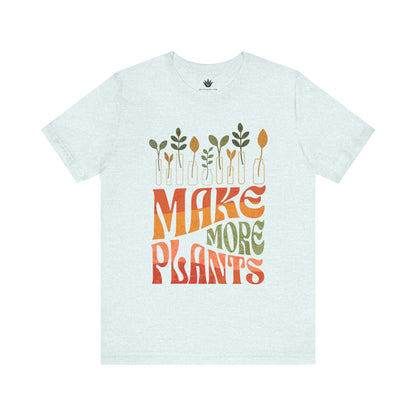 Light blue t-shirt with 'MAKE MORE PLANTS' text and plant illustrations on a white background