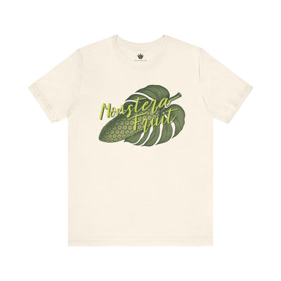 Beige t-shirt with monstera leaf graphic and text on a white background