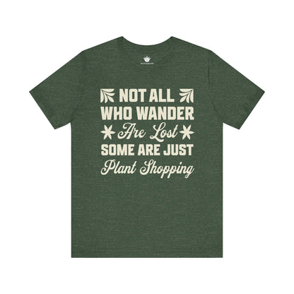 Green t-shirt with white text on a white background