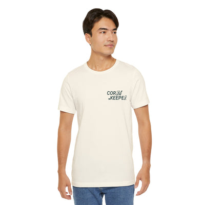 Man wearing a white t-shirt with a logo on a white background