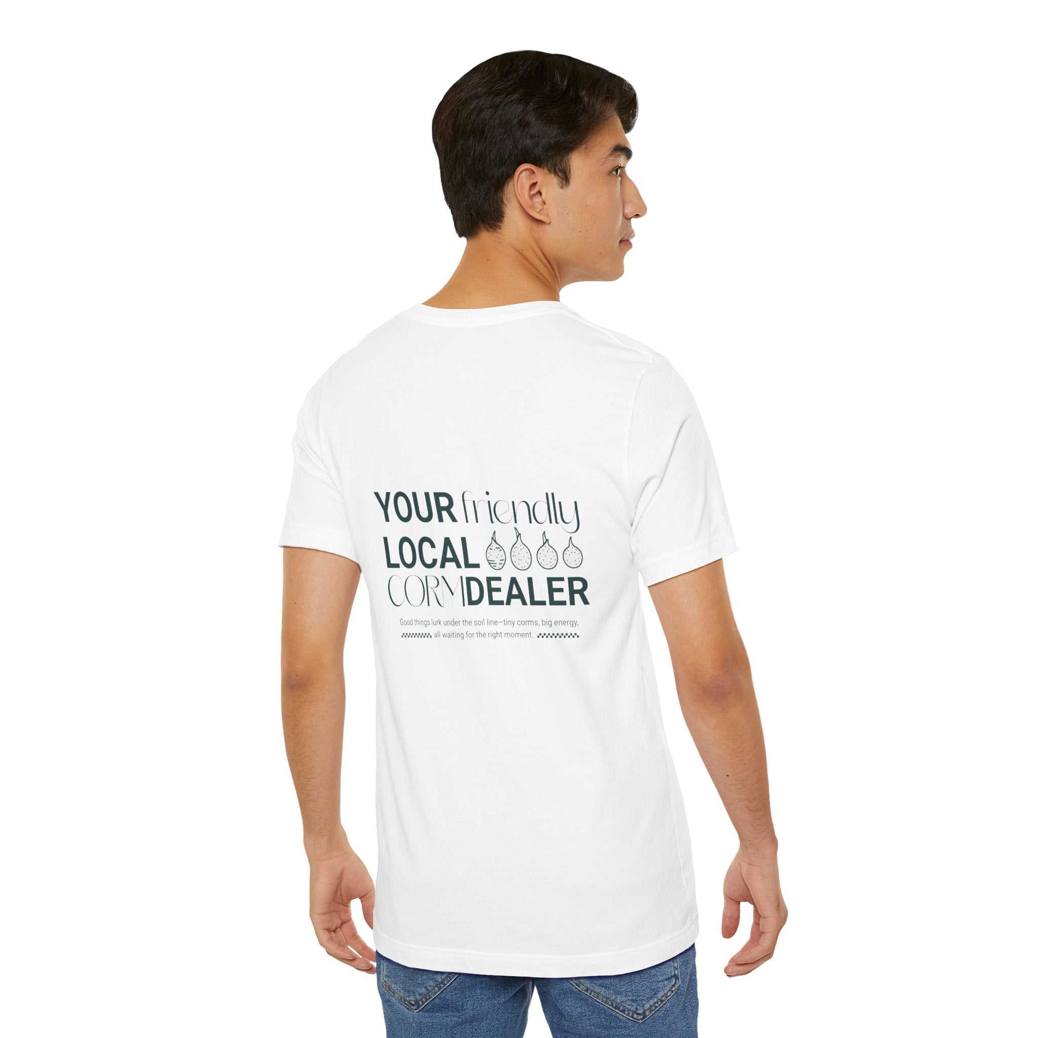 Person wearing a white t-shirt with text on the back, standing against a white background