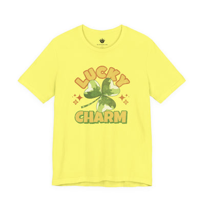 Yellow t-shirt with 'Lucky Charm' graphic on a white background