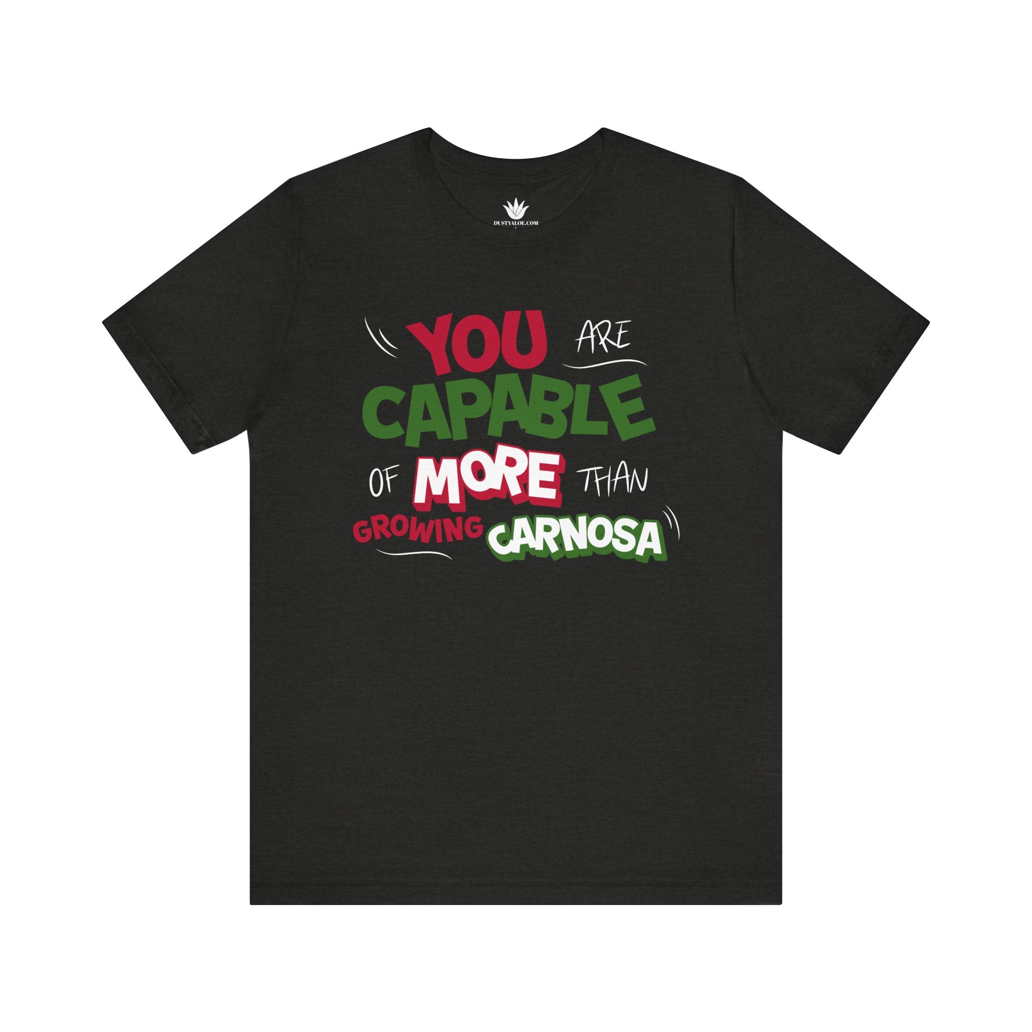 Black t-shirt with bold green, pink, and white “You are capable of more than growing carnosa” lettering for Hoya and plant lovers. Front.