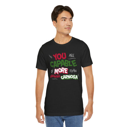 Black t-shirt with bold green, pink, and white “You are capable of more than growing carnosa” lettering for Hoya and plant lovers. Man model.