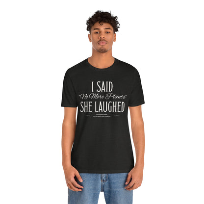 Black t-shirt with white vintage lettering that reads “I Said ‘No More Plants’ She Laughed,” a funny graphic tee for plant lovers and collectors. Man 1