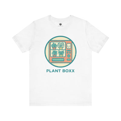White unisex t-shirt with colorful retro vending machine design filled with potted plants and text “Plant Boxx” – perfect for plant lovers.
