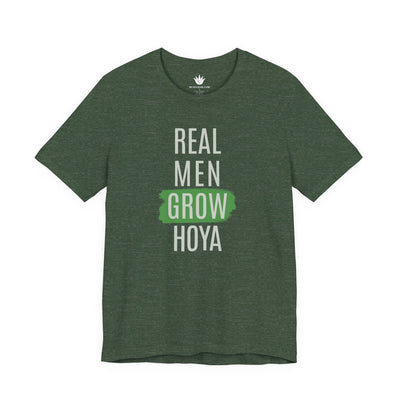 Green t-shirt with 'Real Men Grow Hoya' text on a white background